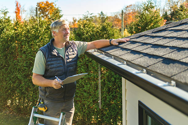 Professional Roof Replacement technician working in Walland, TN